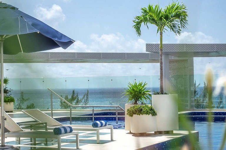 1 Br. | Steps from the beach | Roof w/Ocean view