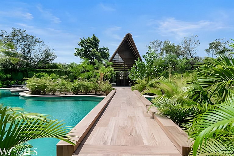 Stylish Pool View • 1BR w/Balcony • Sauna + Gym