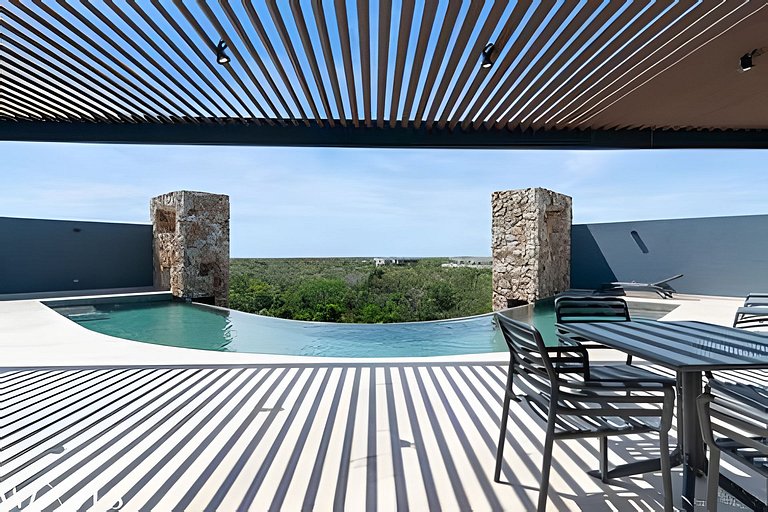 Stylish Pool View • 1BR w/Balcony • Sauna + Gym