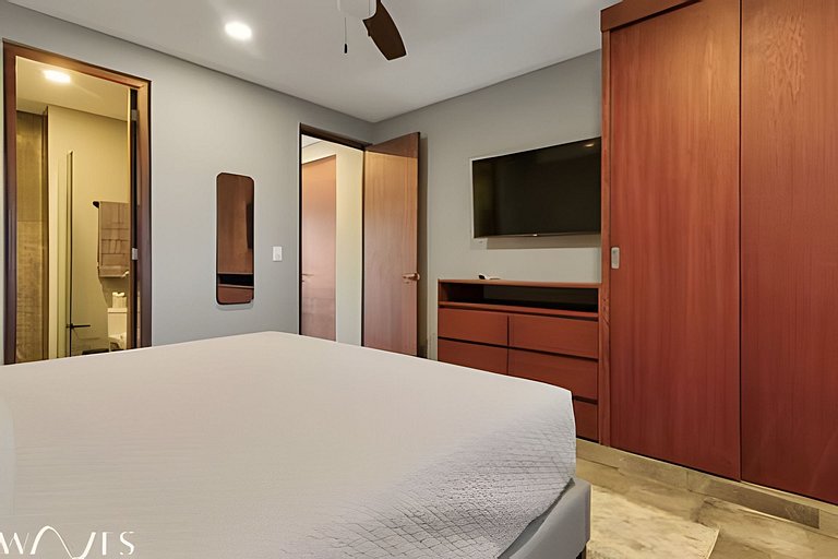 Stylish Pool View • 1BR w/Balcony • Sauna + Gym