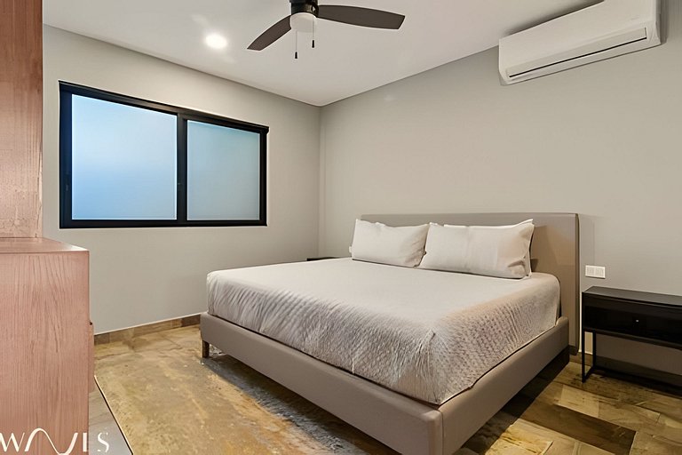 Stylish Pool View • 1BR w/Balcony • Sauna + Gym